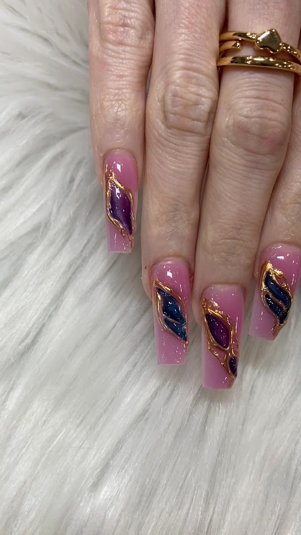Nail salon interior with manicure stations and polish displays.